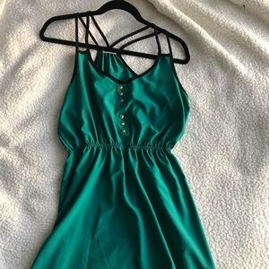 Green dress. Black straps. Size L.